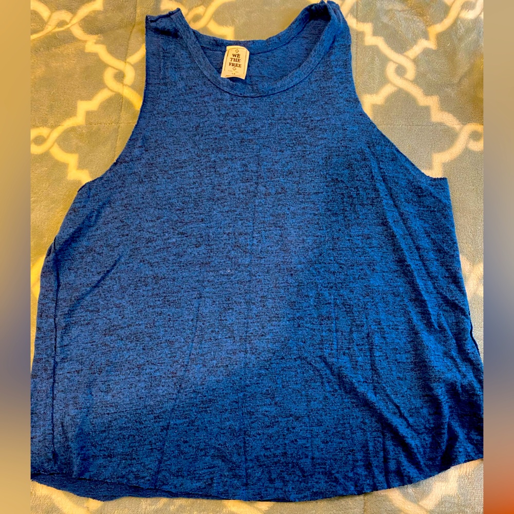 We are free sleeveless flowing blue shirt